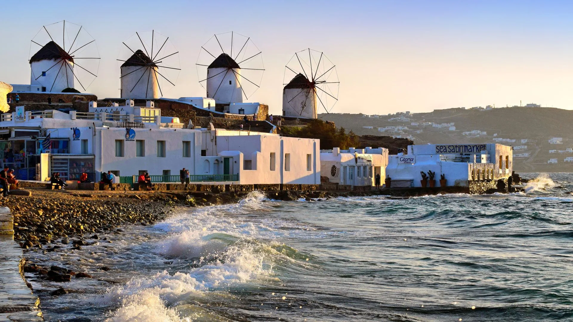 Request your <span class='text-gold-gradient italic'>Mykonos day</span>.